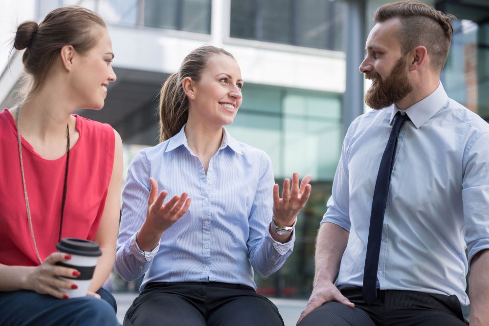 A Picture of a business group of people conversing happily